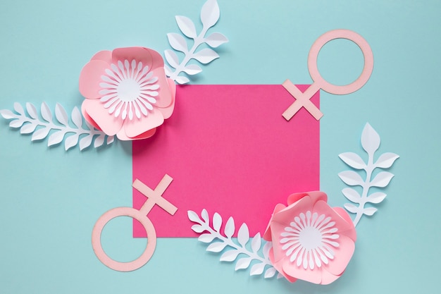 Top view of card with flowers and female symbol for women's day