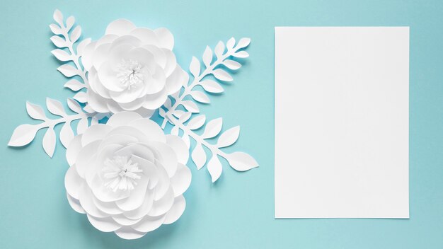 Top view of card with paper flowers for women's day