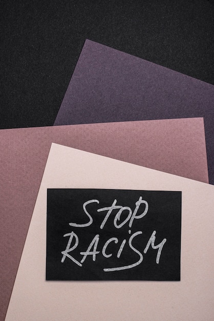 Top view of card with stop racism