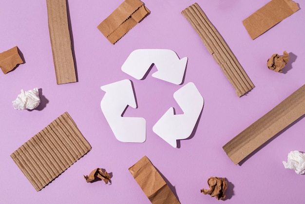 Free photo top view cardboard minimal recycling concept