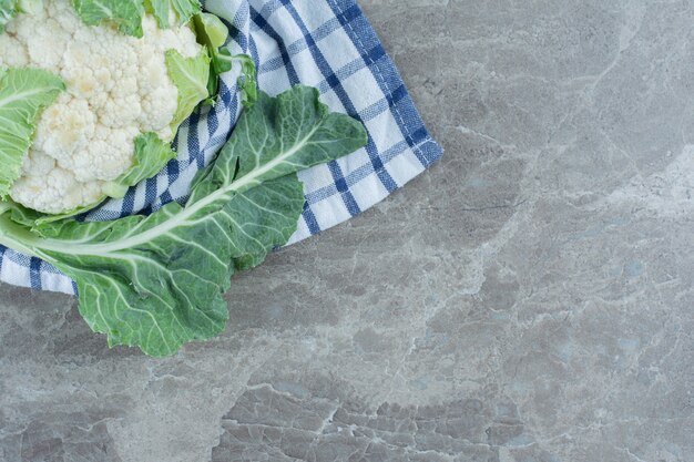 Top view of cauliflower on grey background. 