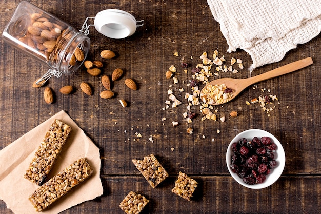 Top view of cereal bars with almonds and cranberries
