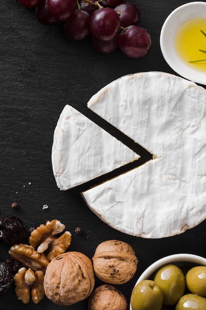 top view cheese composition on black background