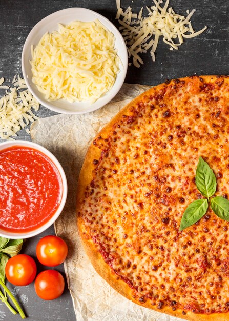 Top view cheese pizza with tomato sauce and mozzarella