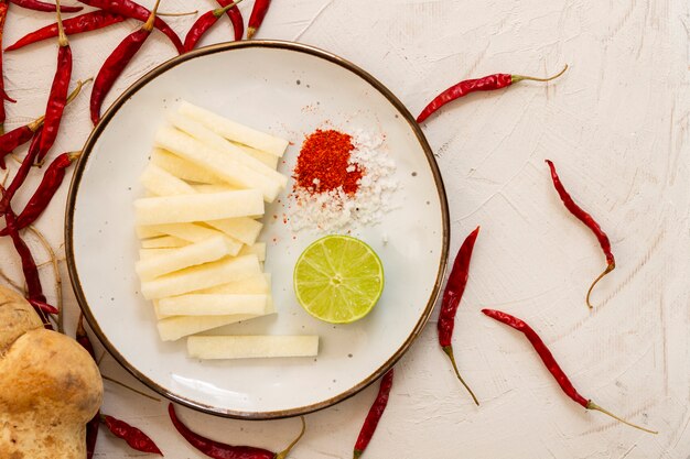 Top view cheese with red hot chilli peppers