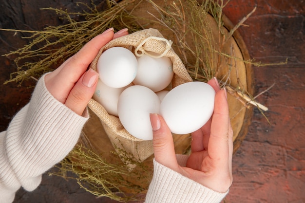 Top view chicken eggs inside little bag