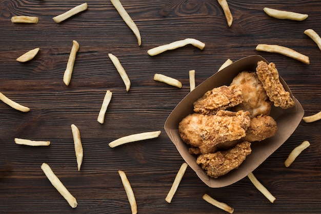 Top view of chicken and french fries