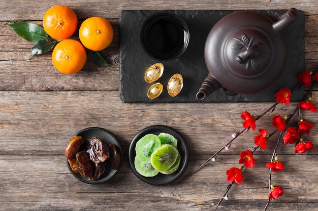 Top view of chinese new year concept on wooden table