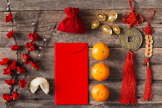 Top view of chinese new year concept on wooden table