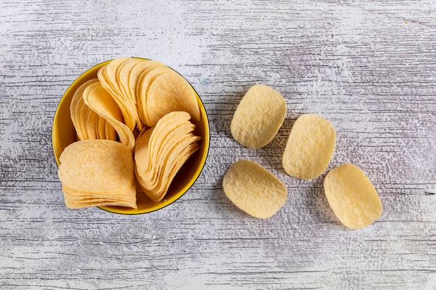 Top view of chips in bowl on white  horizontal