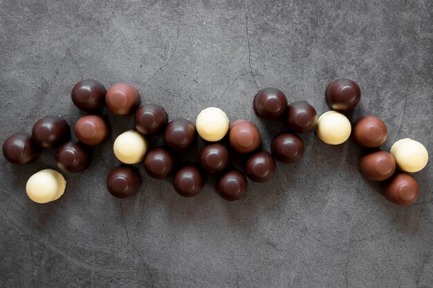 Top view chocolate assortment on dark background