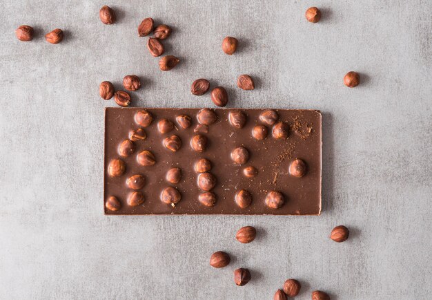 Top view chocolate bar with peanuts