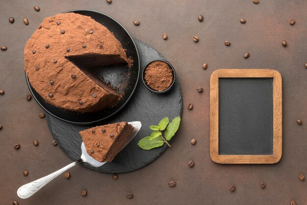 Top view of chocolate cake with blackboard