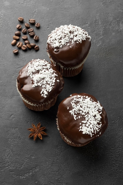 Top view of chocolate desserts with coffee beans