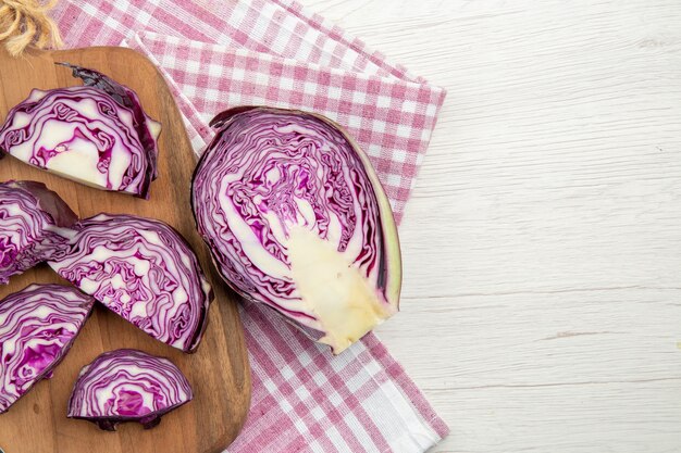 Top view chopped red cabbage on wooden board