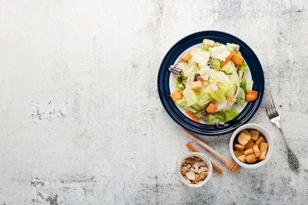 Top view chopped salad with copyspace