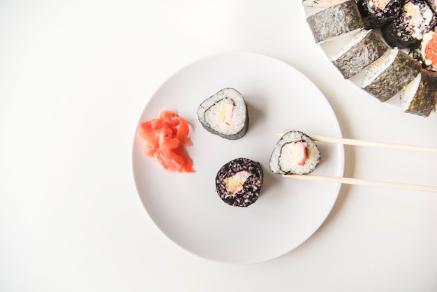 Top view chopsticks on sushi plate