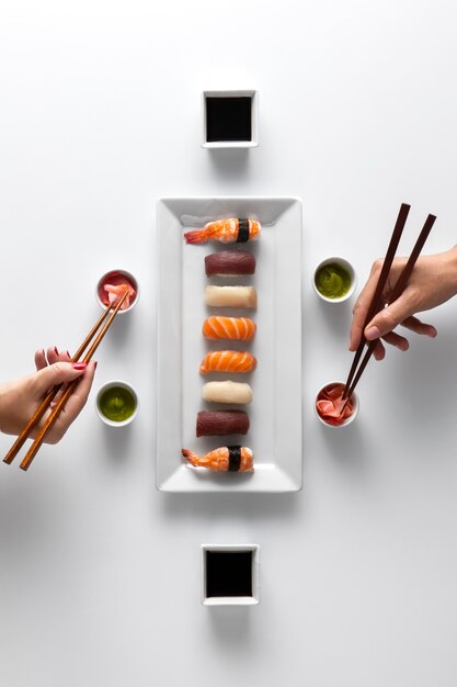 Top view over chopsticks with sushi