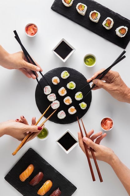 Top view over chopsticks with sushi