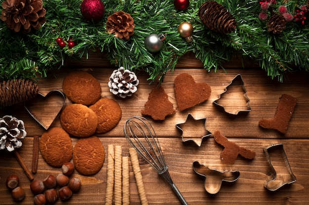 Top view christmas biscuits with ustensils