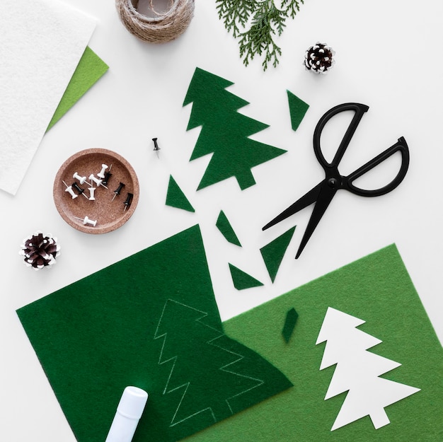 Free photo top view christmas gift decorating essentials