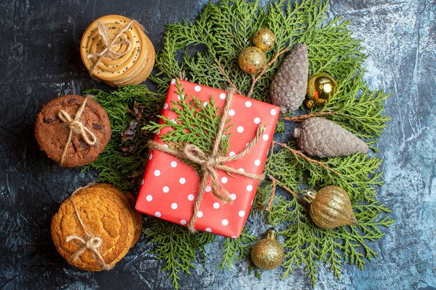 Top view christmas present with different biscuits