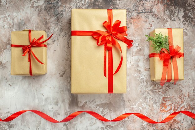 Top view christmas presents with red bows on the white background