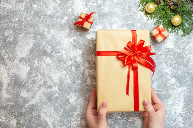 Top view christmas presents with red bows on white background