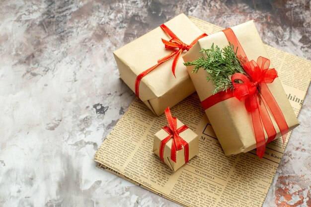 Top view christmas presents with red bows on white background