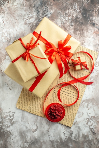 Top view christmas presents with red bows on white background