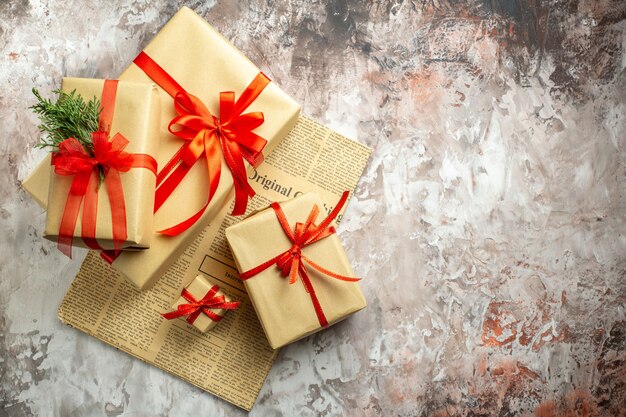 Top view christmas presents with red bows on white background