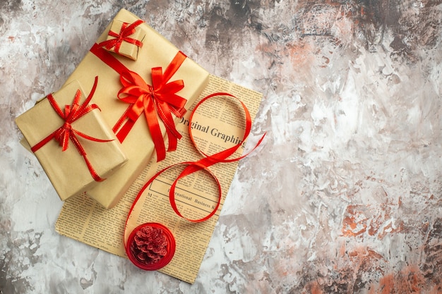 Top view christmas presents with red bows on white background