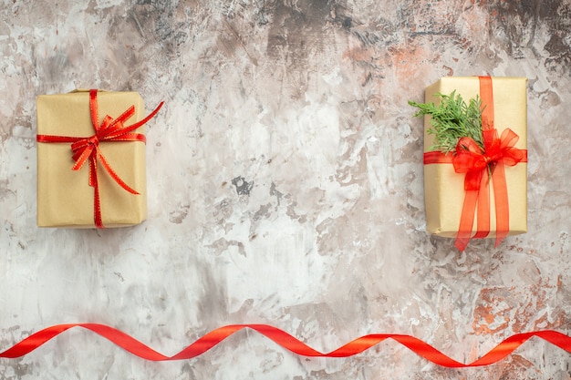 Top view christmas presents with red bows on white background