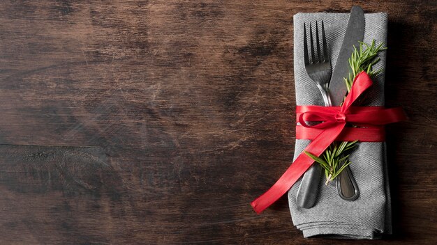 Top view christmas tableware arrangement with copy space