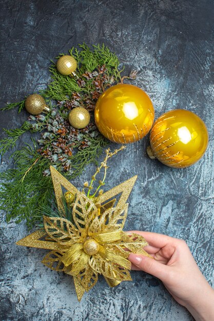 Top view christmas tree toys on a light-dark background