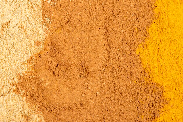 Top view of cinnamon powder textured background