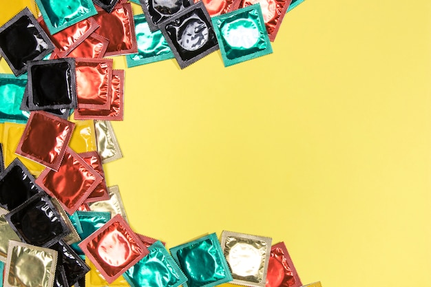 Top view circular frame with colourful condoms
