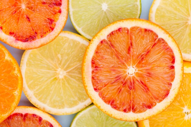 Top view citric fruit slices on the table