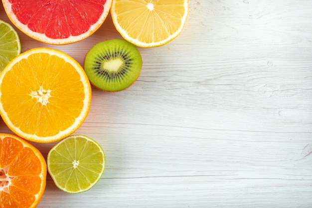 top view citrus fruits with copy space on white surface