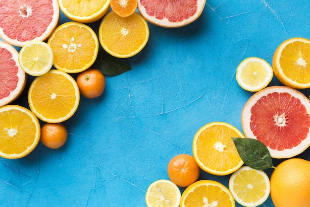 Top view of citrus fruits with copy space