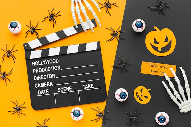 Free photo top view clapperboard for halloween concept