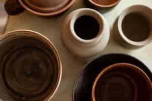 Free photo top view clay pots arrangement