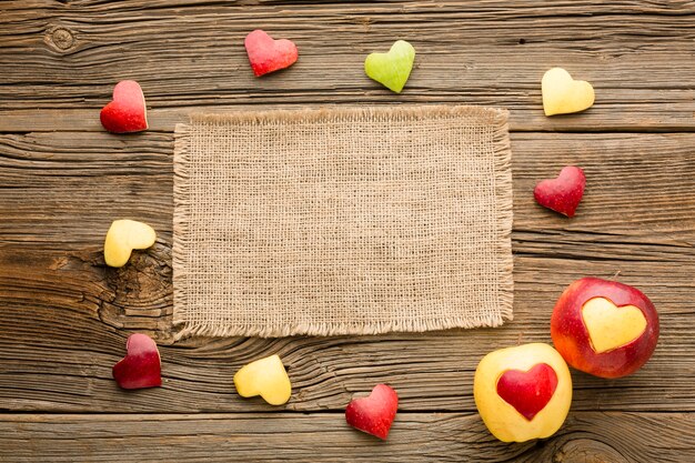 Top view of cloth with fruit heart shapes