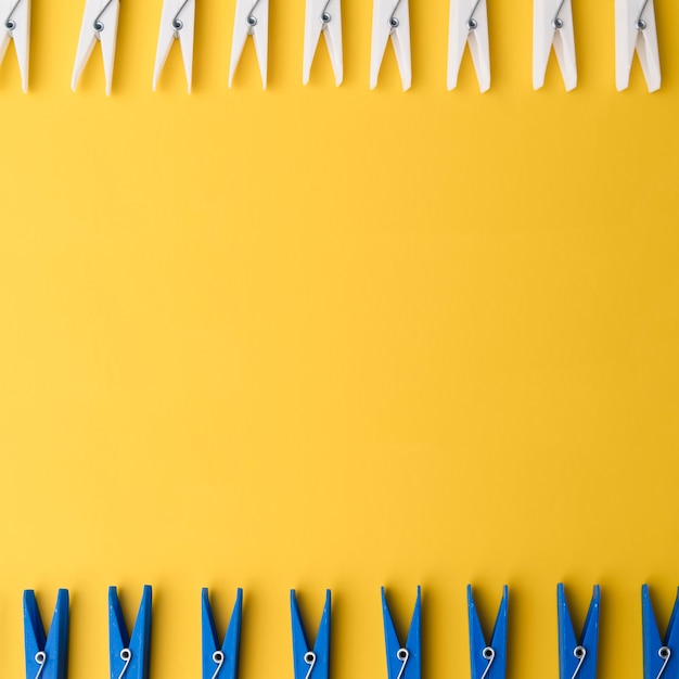 Top view clothespin with yellow background