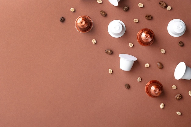 Top view coffee beans and coffee capsules