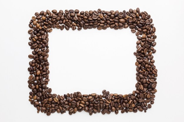 Top view of coffee beans frame with copy space