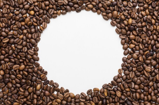 Top view of coffee beans frame with copy space