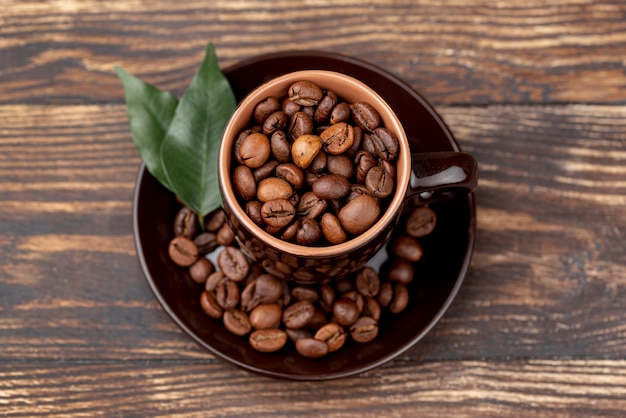 Top view of coffee beans on wooden table