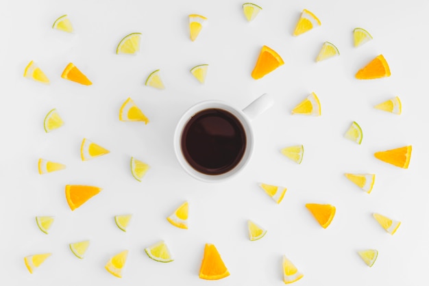 Free photo top view of coffee cup and fruit bits