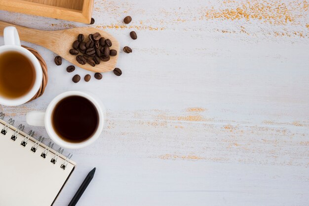 Top view coffee cup with notebook